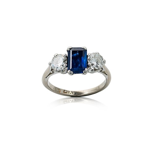 Lot 15 - A sapphire and diamond three stone ring