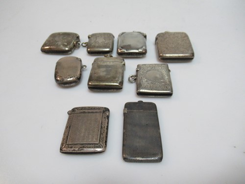 Lot 353 - Seven silver vesta cases together with 2...