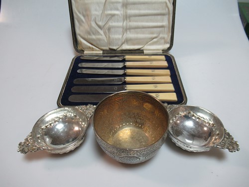 Lot 354 - A silver sugar bowl, two silver tea strainer...