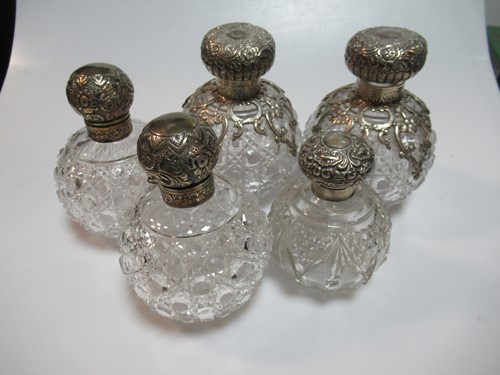 Lot 355 - Two pairs of silver topped glass dressing...