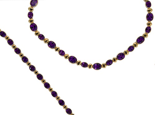 Lot 114 - An 18ct gold amethyst set necklet and matching bracelet