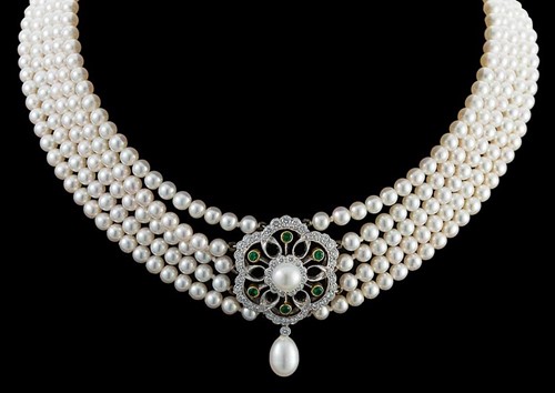 Lot 176 - A five row cultured pearl choker with diamond and emerald centrepiece