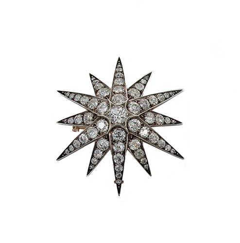 Lot 198 - A Victorian diamond star pendant/brooch
