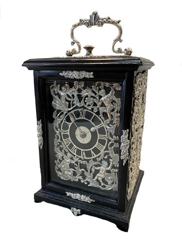 Lot 324 - A Victorian carriage clock with silver embellishments