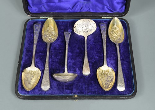 Lot 392 - A cased harlequin set of George III and later silver tablespoons and ladles with later decoration