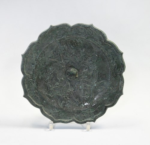 Lot 143 - A Chinese bronze mirror, possibly Tang Dynasty (AD618-907)
