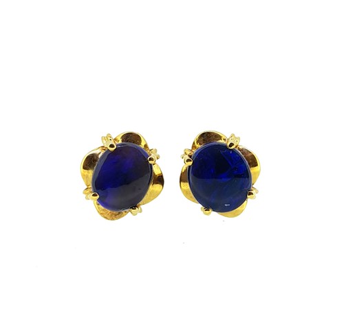 Lot 56 - A pair of black opal ear studs