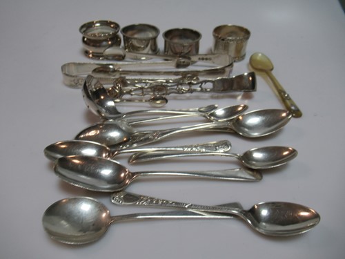 Lot 349 - A collection of silver flatware together with...