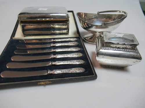 Lot 346 - A silver sugar basket, a silver miniature tea...