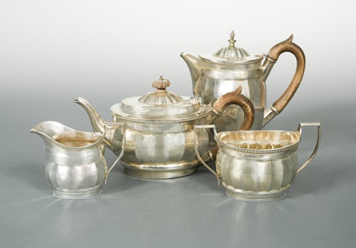 Lot 442 - An Edward VII silver four-piece tea set
