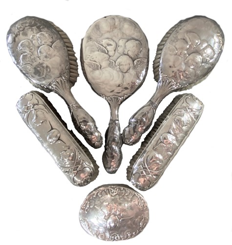 Lot 306 - An Edward VII silver backed six-piece dressing table set