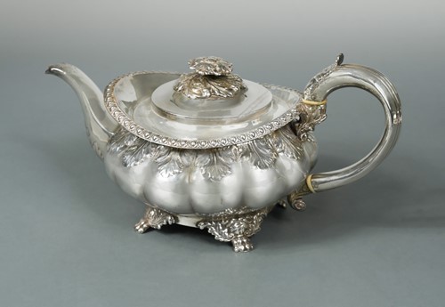 Lot 395 - A George IV silver teapot