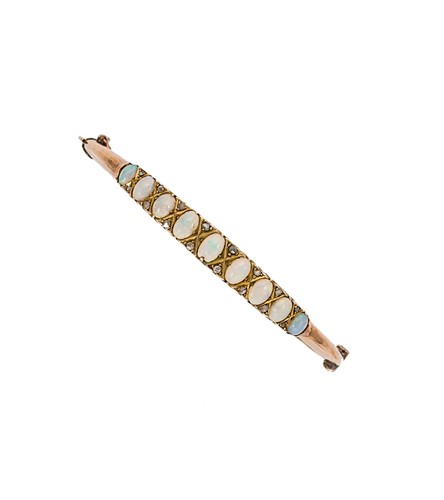 Lot 157 - An early 20th century opal and diamond bangle