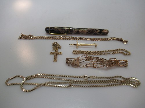 Lot 313 - A Bakelite fountain pen together with a dagger...