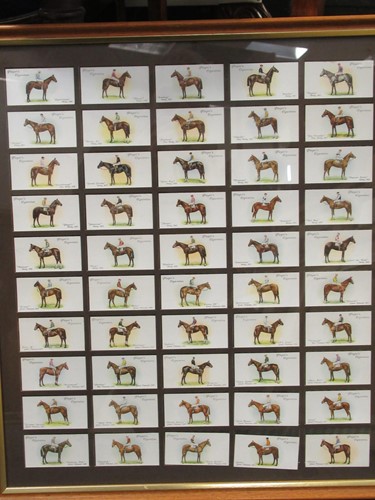 Lot 455 - A framed racecard program printed on silk for...