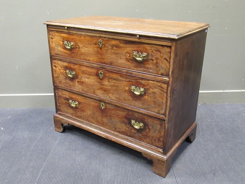 Lot 599 - A mahogany chest of 3 drawers below a brushing...