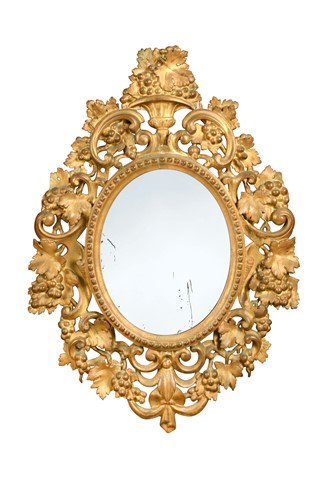Lot 873 - A Florentine carved giltwood wall mirror, early 20th century