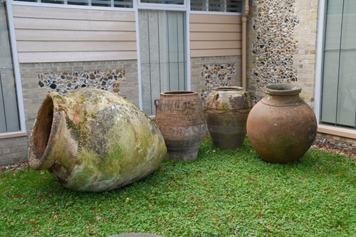 Lot 977 - Three terracotta olive jars
