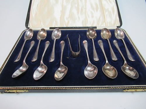 Lot 340 - A cased set of silver teaspoons and tongs...