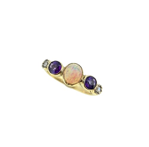 Lot 80 - An opal, amethyst and diamond ring