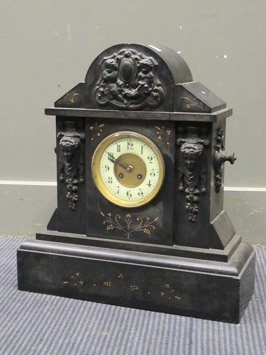 Lot 606 - A marble mantel clock with applied metal...