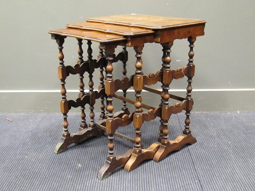 Lot 633 - A nest of three reproduction walnut serpentine...