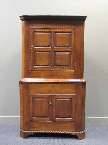 Lot 547 - An antique oak corner inlaid with diagonal...