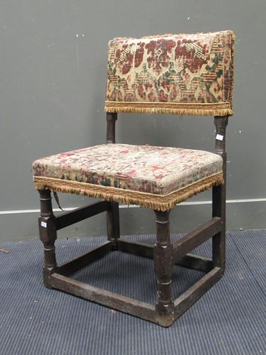 Lot 637 - An 18th century oak chair with early tapestry...