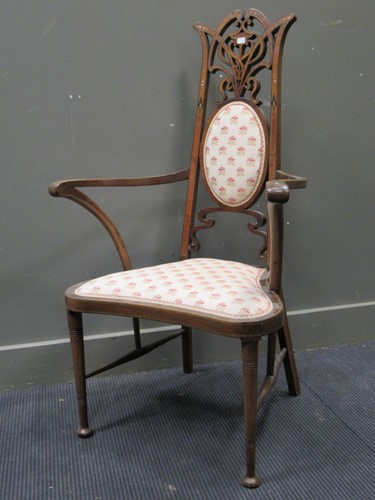 Lot 607 - An Edwardian mahogany armchair in the Art...