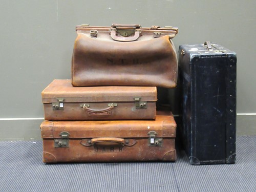 Lot 173 - A leather gladstone bag, two other leather...