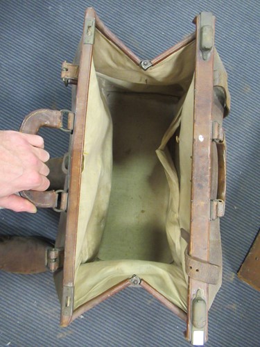 Lot 173 - A leather gladstone bag, two other leather...