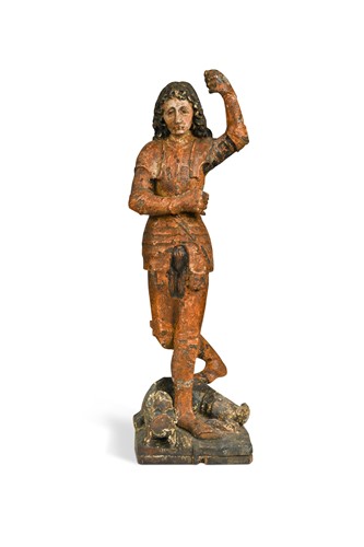 Lot 717 - A carved polychrome figure of St George and the Dragon, possibly 15th century