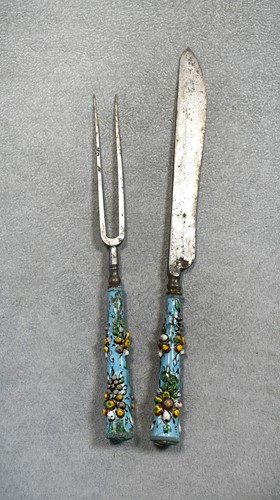 Lot 789 - An enamel handled knife and fork, 18th century