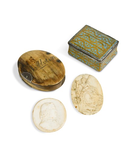 Lot 777 - A bone medallion carved with the profile of a man, early 19th century