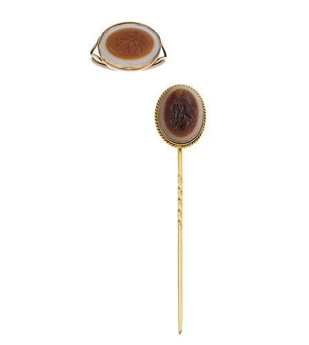 Lot 132 - A banded agate intaglio ring and stick pin