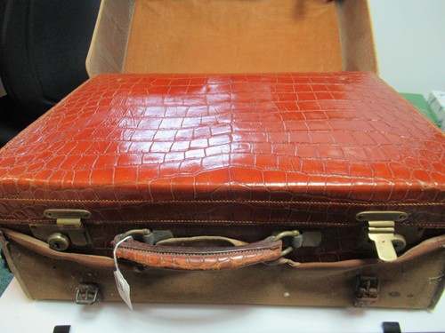 Lot 359 - A crocodile skin vanity case by JW Benson with...