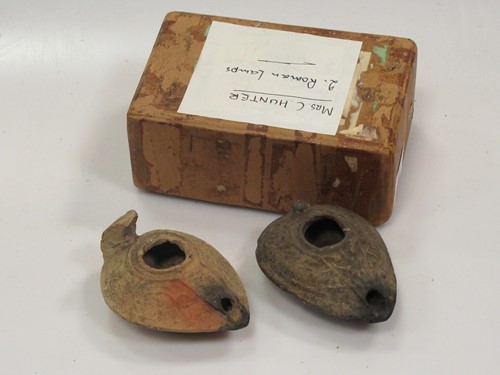 Lot 72 - Two Roman pottery oil lamps