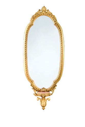 Lot 819 - A carved giltwood and gesso moulded pier mirror, 19th century