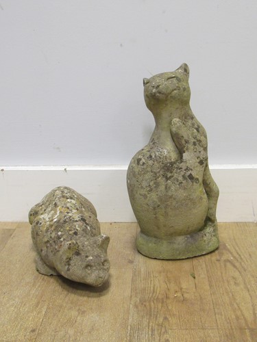 Lot 738 - Two concrete garden statues modelled as cats