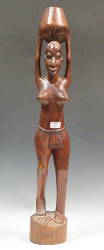 Lot 80 - A carved tribal figure of a woman 87cm high