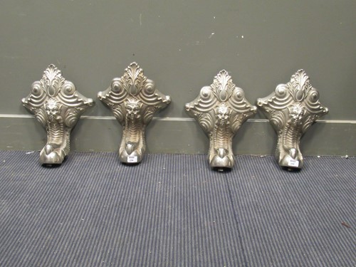 Lot 256 - Four nickel plated scroll cast feet