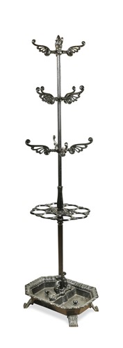 Lot 951 - A black painted cast iron stick and coat stand, 20th century