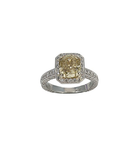 Lot 216 - A yellow diamond halo style cluster ring