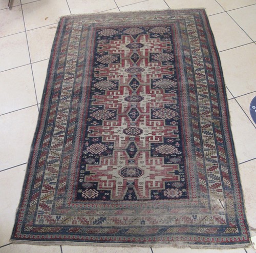 Lot 585 - A 19th century caucasian rug 202 x 130cm