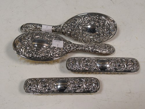 Lot 329 - A silver 4 piece brush set