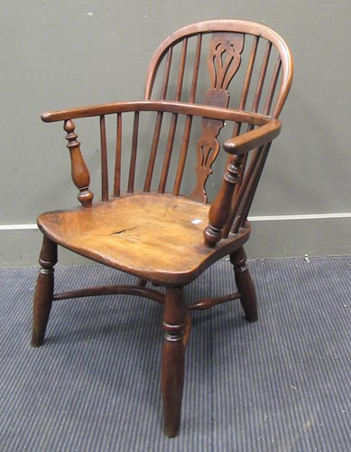 Lot 645 - A mid-19th century yew and elm Windsor arm...