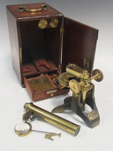 Lot 131 - A brass microscope by Arnold & Sons in a...