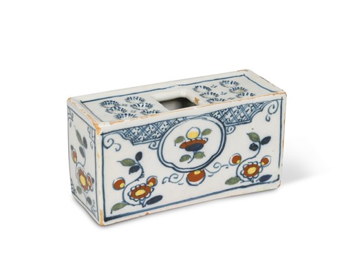 Lot 406 - A delft miniature polychrome flower brick, possibly Wincanton, 1740