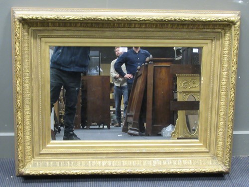 Lot 609 - A rectangular gilt wood wall mirror, 84 x 113cm