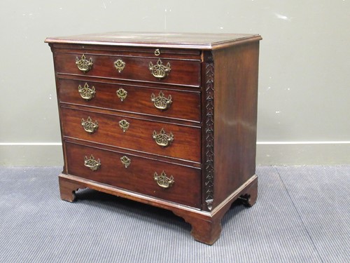 Lot 671 - A George III mahogany chest of drawers with...